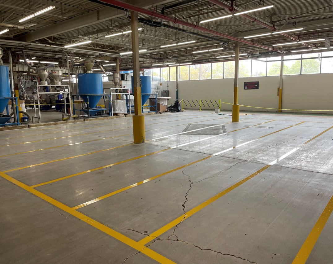 Automotive facility floor with safety lines and epoxy coating in Toronto
