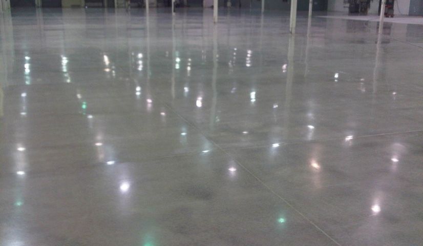 Empty warehouse with shiny polished concrete floors