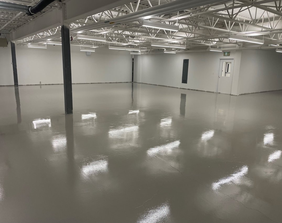 Gray epoxy flooring in a commercial building in Ajax