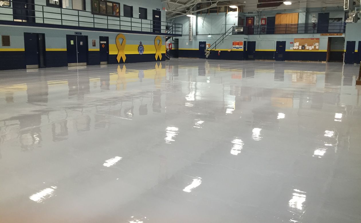 Gray epoxy
				flooring in toronto industrial military base