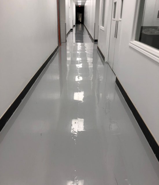 Commercial building Toronto after new gray epoxy flooring