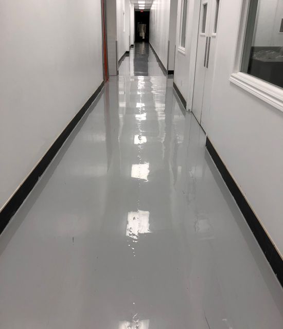 Commercial building Toronto after new gray epoxy flooring