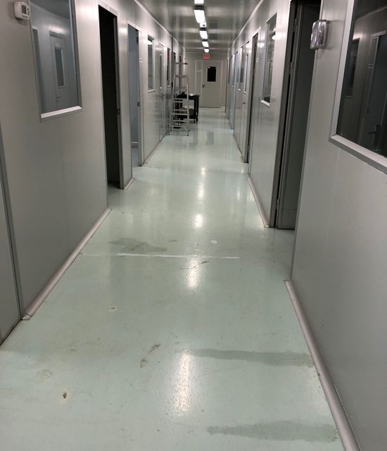 Commercial building hallway in Toronto broken concrete