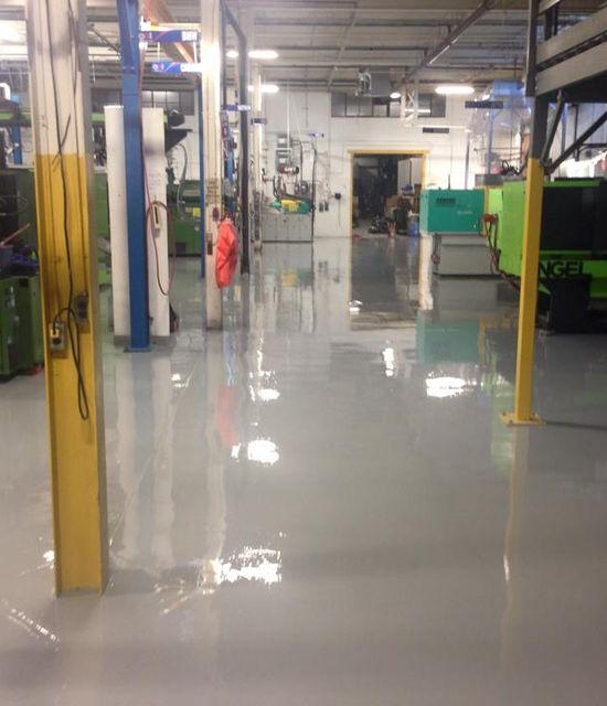 New gray epoxy flooring installed in Toronto industrial facility