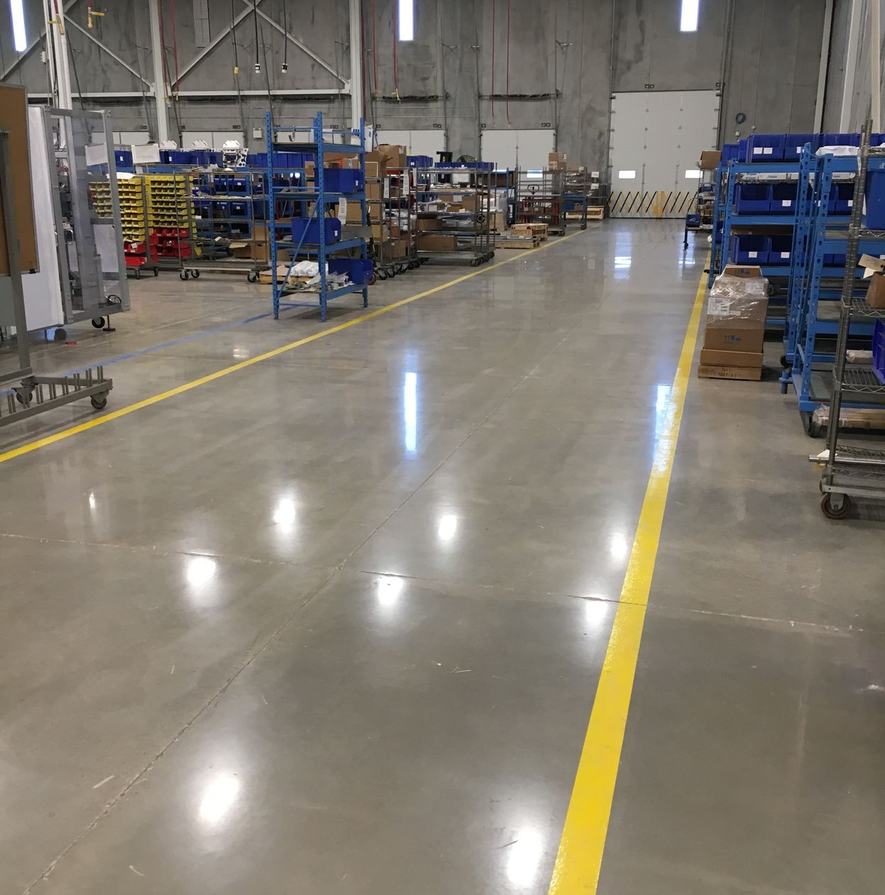 Industrial warehouse polished concrete and safety lines