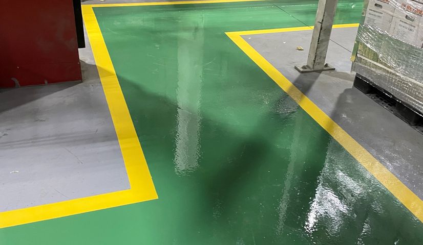 Empty warehouse with shiny polished concrete floors