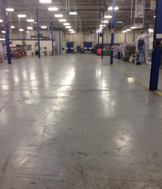 Industrial warehouse Toronto dirty and cracked concrete floors