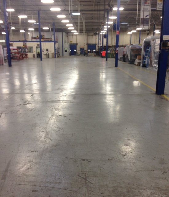 Industrial warehouse Toronto dirty and cracked concrete floors